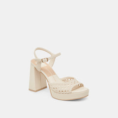 Dolce Vita SHOES | PEYTEN WIDE HEELS CREME WOVEN STELLA
– Dolce Vita