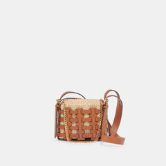 Dolce Vita HANDBAGS | CASSIS CROSSBODY SADDLE NATURAL RAFFIA
 – Dolce Vita