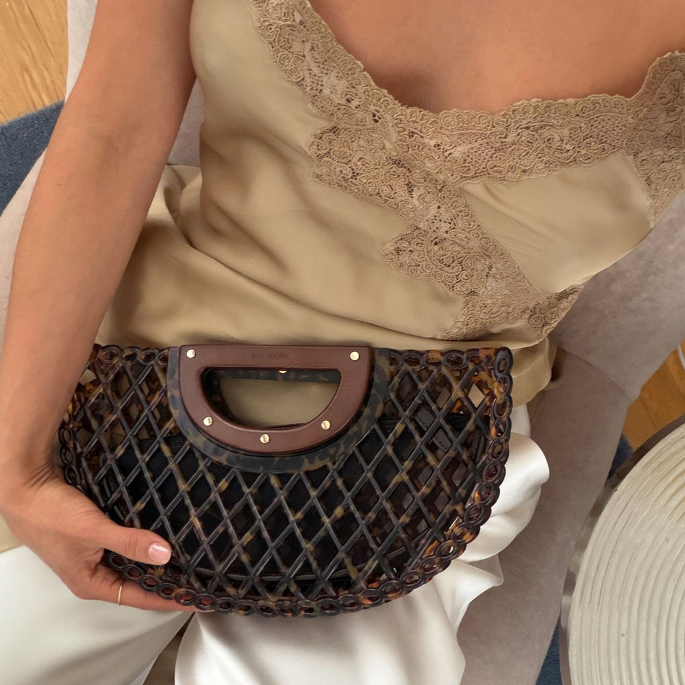 Dolce Vita HANDBAGS | Solandra Tortoise Jelly Clutch